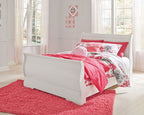 White full sleigh bed frame with curved rails and matching footboard