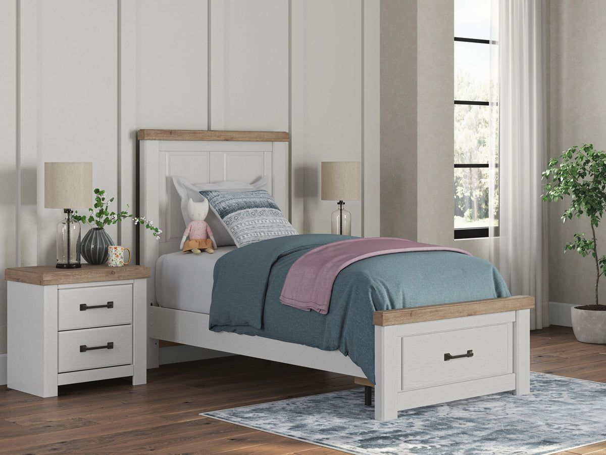 White storage bed with wood-trim headboard and two under-bed drawers, shown in bedroom