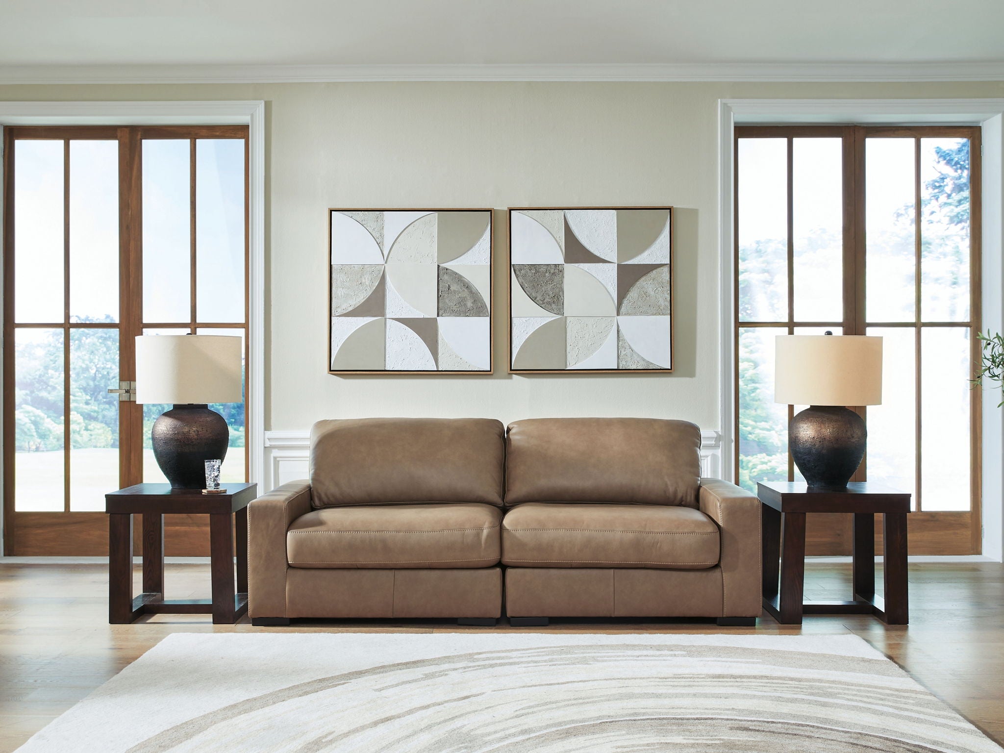 Two-seat sectional sofa with chaise-style extension, taupe upholstery, squared arms