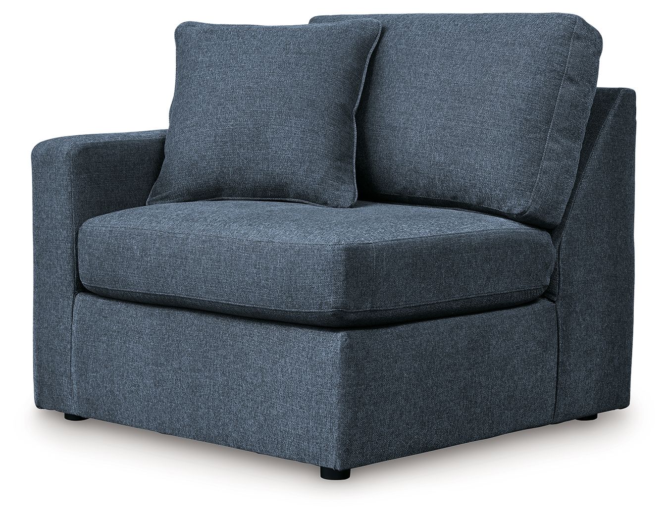 Ink blue fabric corner chair with curved arms, rounded seat, and supportive back cushions.