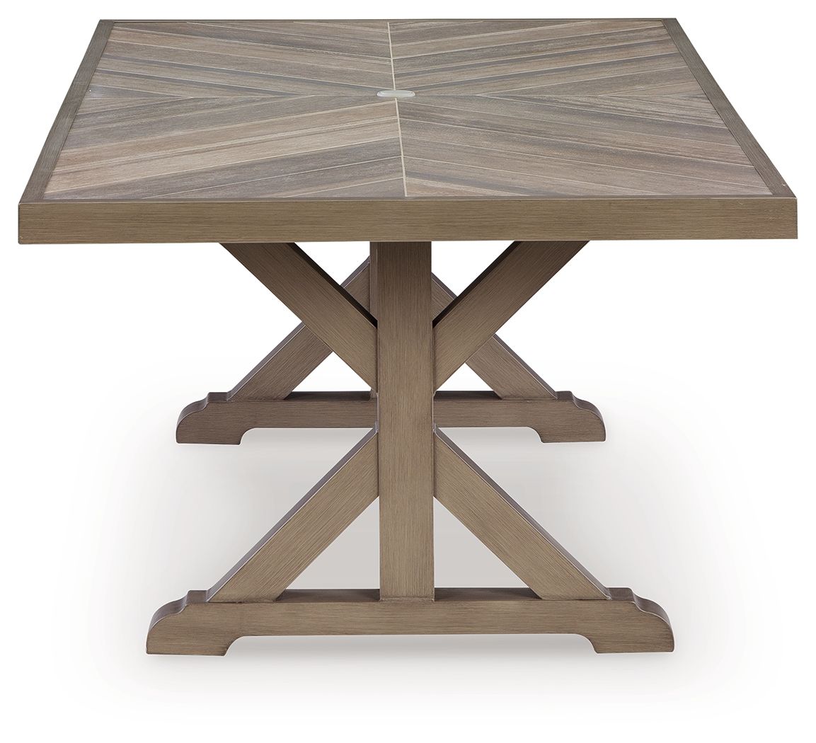 Rectangular dining table with umbrella opening, beige slatted top and X base with pole.