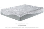 White quilted mattress top with gray base, shown from a side angle