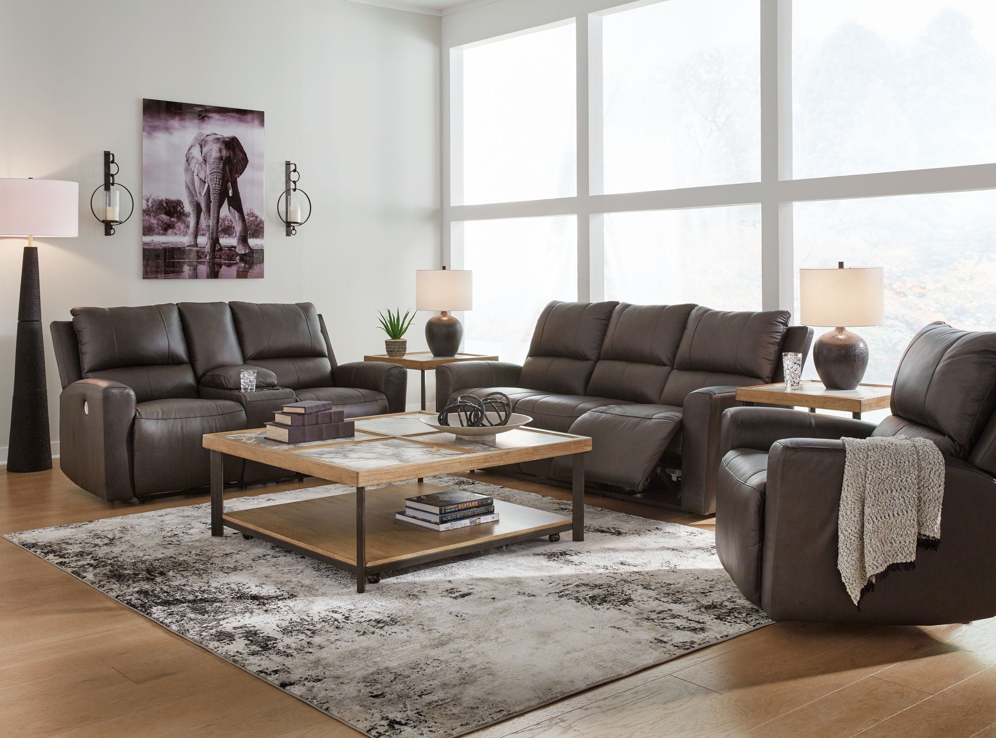 Boxmere dark brown power reclining sofa and loveseat with plush seat cushions