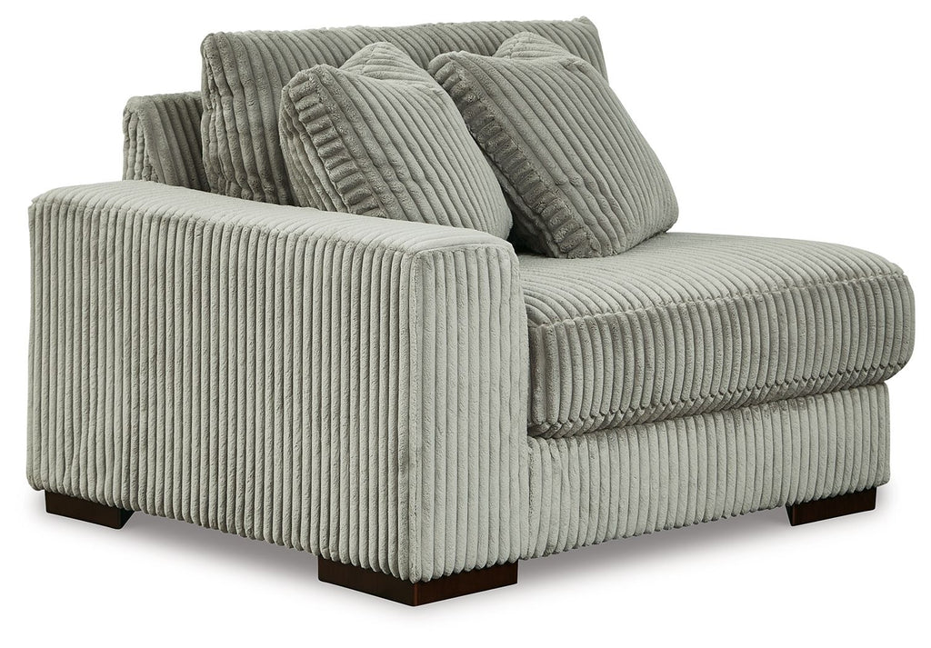Corduroy corner chair in fog gray with two back cushions and wide arm
