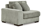 Corduroy corner chair in fog gray with two back cushions and wide arm