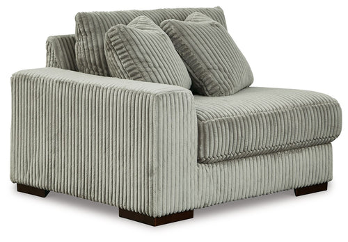 Corduroy corner chair in fog gray with two back cushions and wide arm