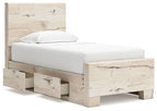 Panel bed with storage, white mattress, light wood underbed drawers with raised panels