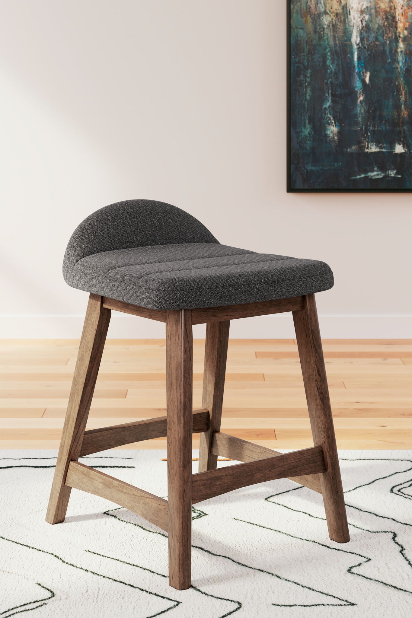 Upholstered barstool with dark gray cushioned seat and back, wooden frame