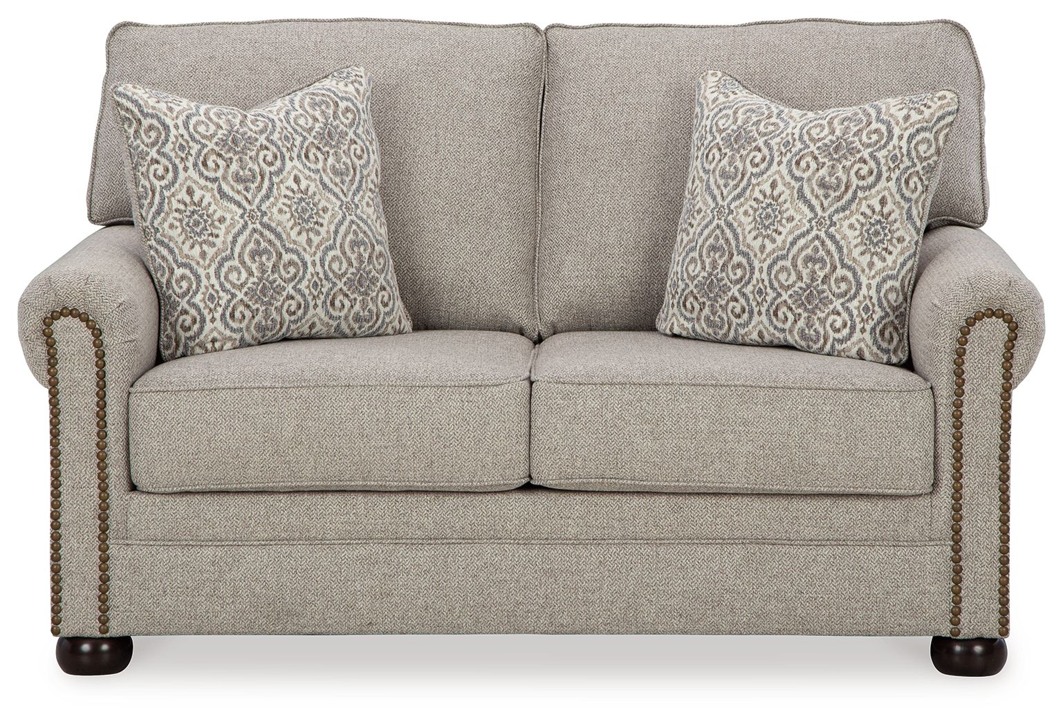 Gray-beige loveseat with two patterned throw pillows, tight back, and rolled arms