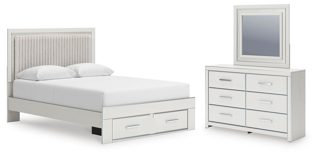 White upholstered panel bed with under-drawer storage and matching dresser with mirror