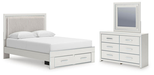 White upholstered panel bed with under-drawer storage and matching dresser with mirror