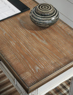 Home office desk return corner with brown wood top and round decorative tray
