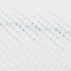White mattress fabric surface with small quilted pattern