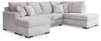 Gray fabric sectional sofa with chaise and tufted cushions, rounded arms and dark legs