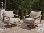 Pair of beige swivel lounge chairs with seat cushions and tall back cushions