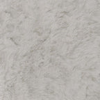 Light gray faux-fur oversized accent ottoman, tufted square top