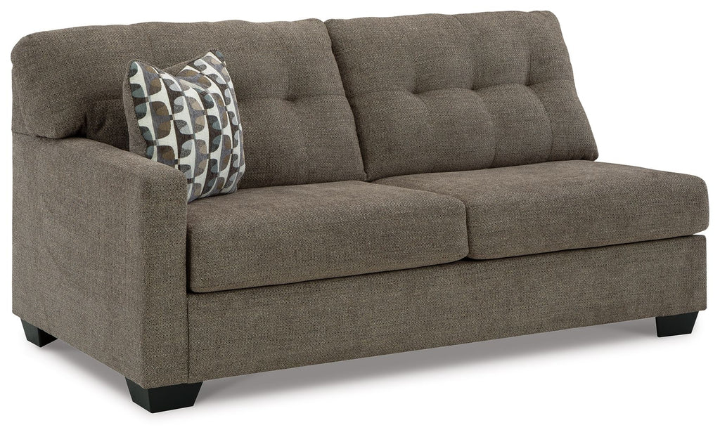 Chocolate-brown full sofa sleeper, tufted back, patterned throw pillow