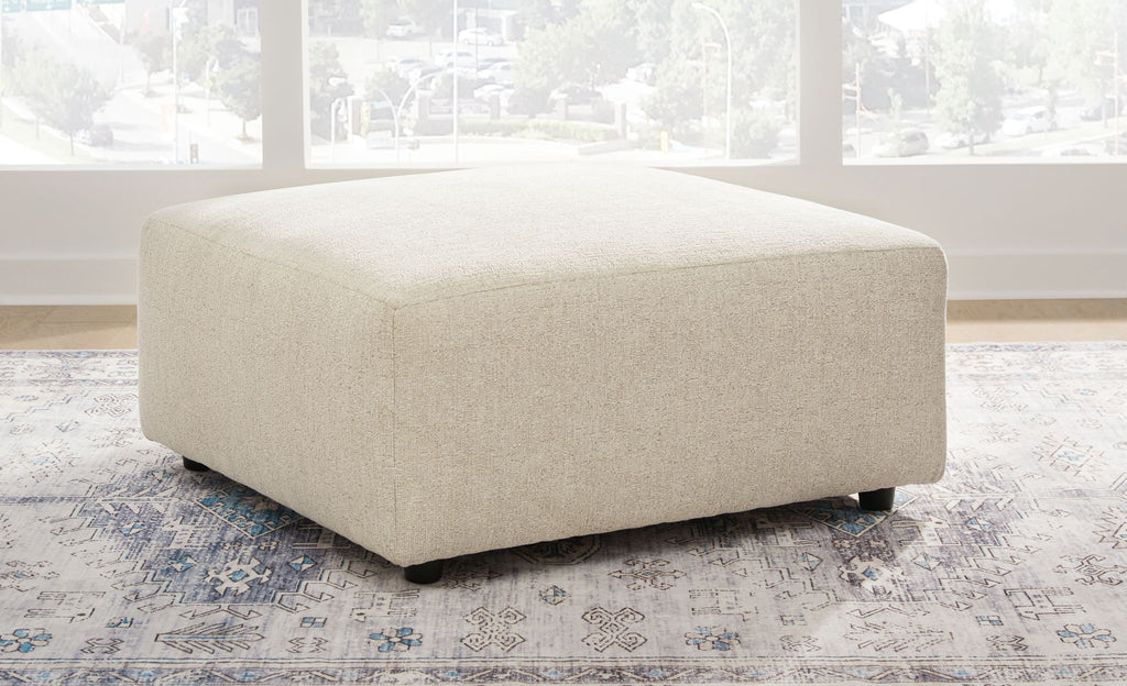 Pearl silver upholstered ottoman with square top and low legs