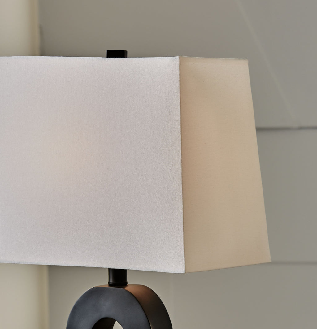 Black table lamp base and white square shade close-up