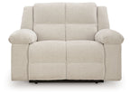 Recliner chair in light beige with rounded arms, cushioned back, and center seam