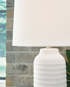 White poly table lamp top with drum shade over ribbed base