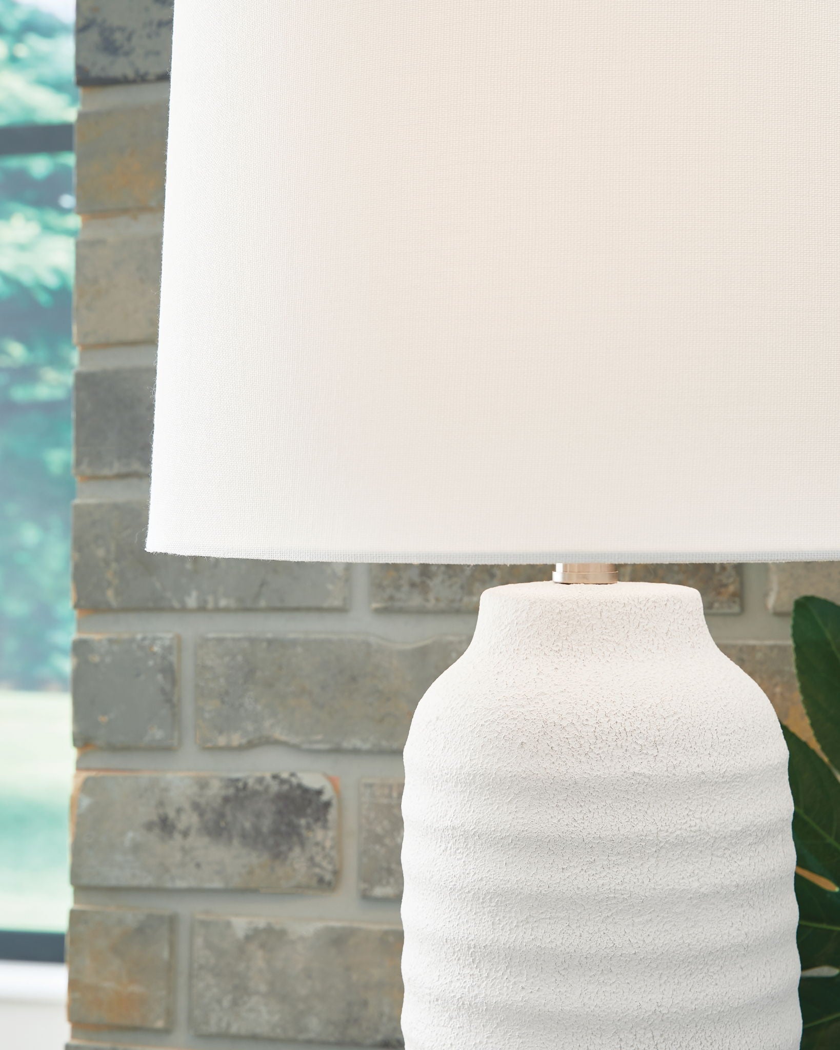 White poly table lamp top with drum shade over ribbed base