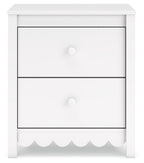 White two-drawer nightstand with two round knobs and scalloped base panel