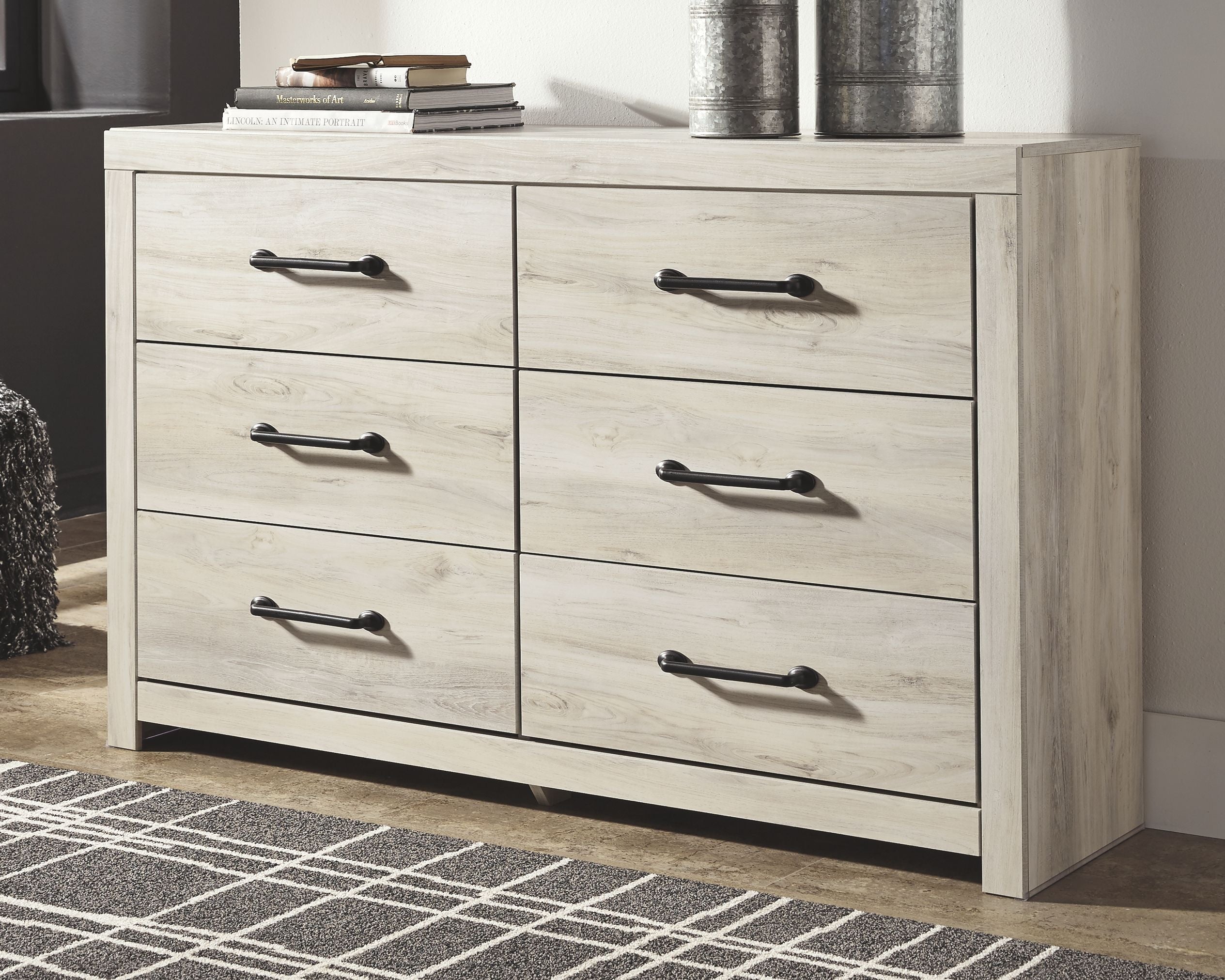 Cambeck whitewash dresser with six drawers and black bar handles, smooth front panels