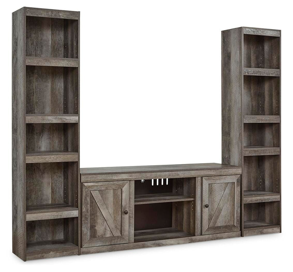Gray 3-piece entertainment center with two tall open shelves and low console with doors