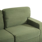 Green corduroy sectional chaise with backrest and ribbed seat cushions