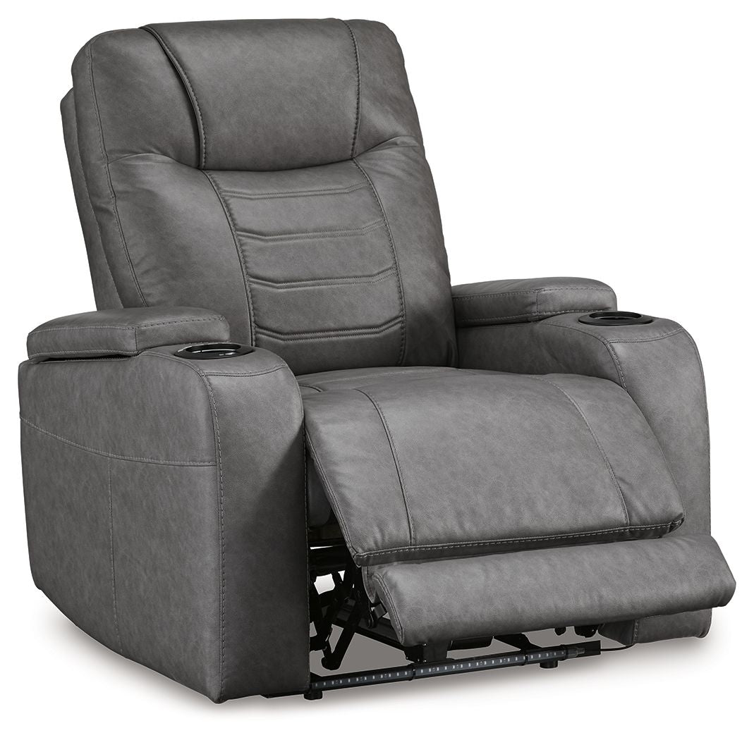 Slate gray power recliner with adjustable headrest, padded armrests, and extended footrest