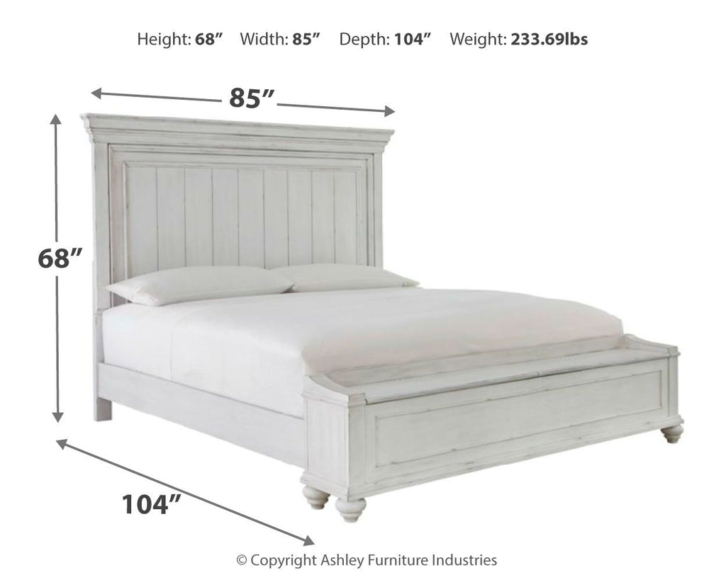 White panel bed with tall headboard and extended platform frame, matching side rails.