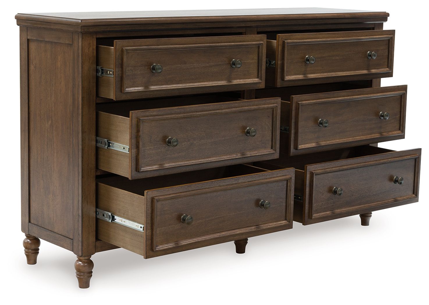 Brown dresser showing six drawers, long pulls, and carved trim with turned legs
