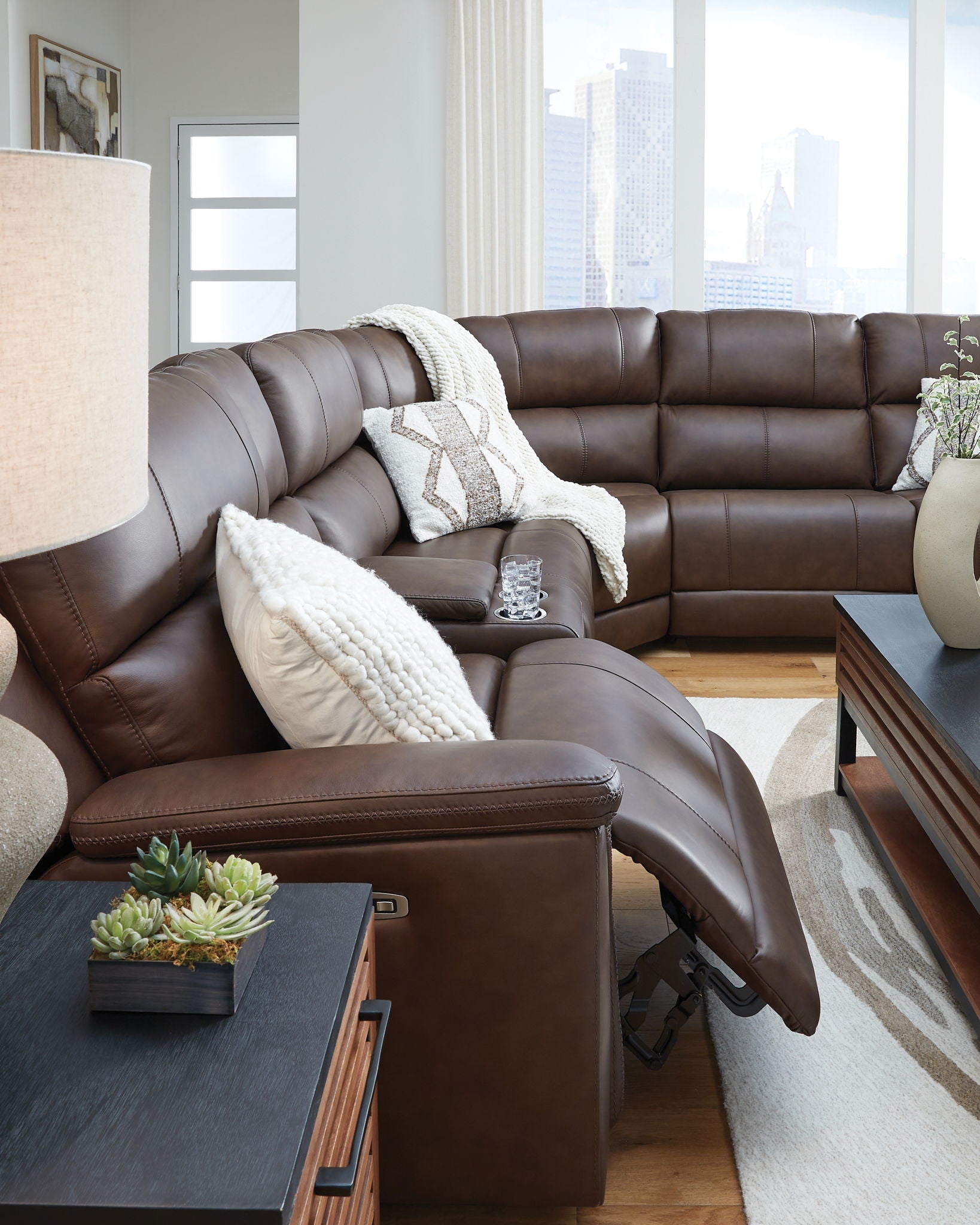 Power reclining sectional sofa, dark espresso brown with extended recliner and padded arm console
