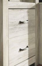Whitewash cabinet with two stacked drawer fronts and knob pulls