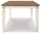 Rectangular dining room extension table, chipped white legs and medium-brown wood top