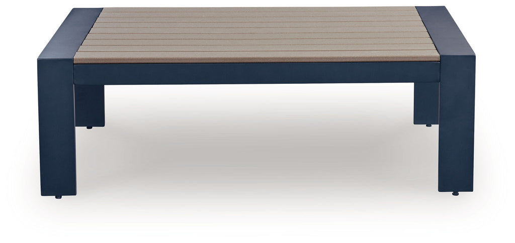 Blue rectangular cocktail table with slatted beige top and dark legs