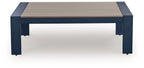 Blue rectangular cocktail table with slatted beige top and dark legs