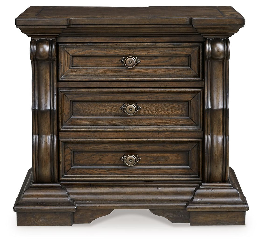 Dark brown three-drawer night stand, front view with round knob pulls