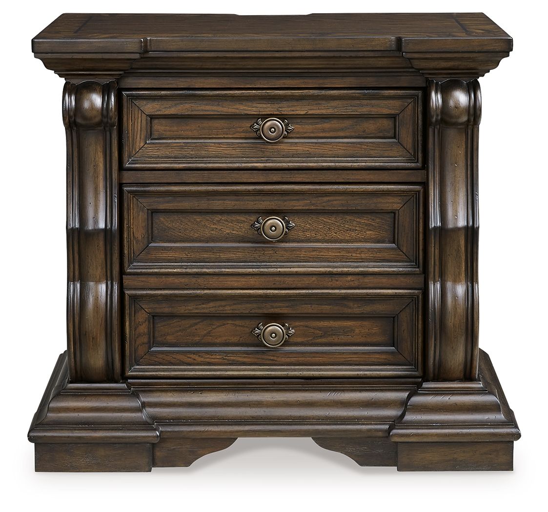 Dark brown three-drawer night stand, front view with round knob pulls