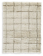 Beige shag rug with dark grid pattern, textured loop pile