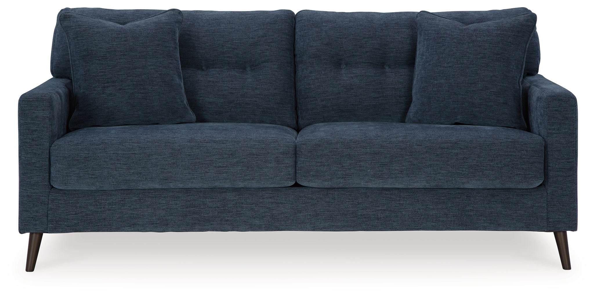 Blue upholstered sofa with three seat cushions and tall back pillows