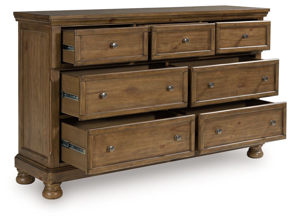 Feddinger medium brown wooden dresser with drawers pulled out and metal pulls