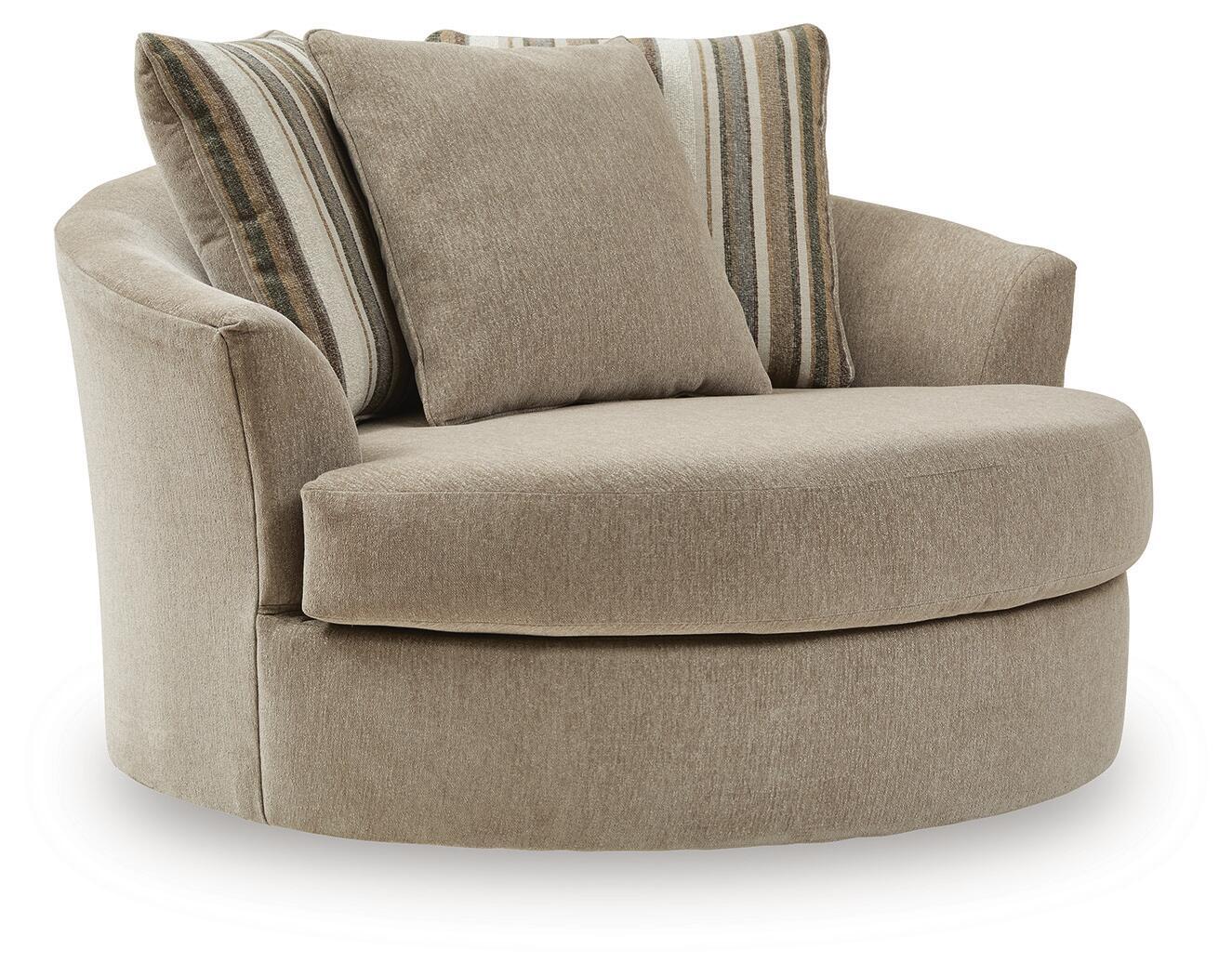 Oversized accent chair in beige fabric with two striped back cushions and rounded arms.
