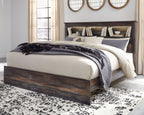 Panel bookcase bed with side storage drawers, dark wood finish, neutral and black bedding