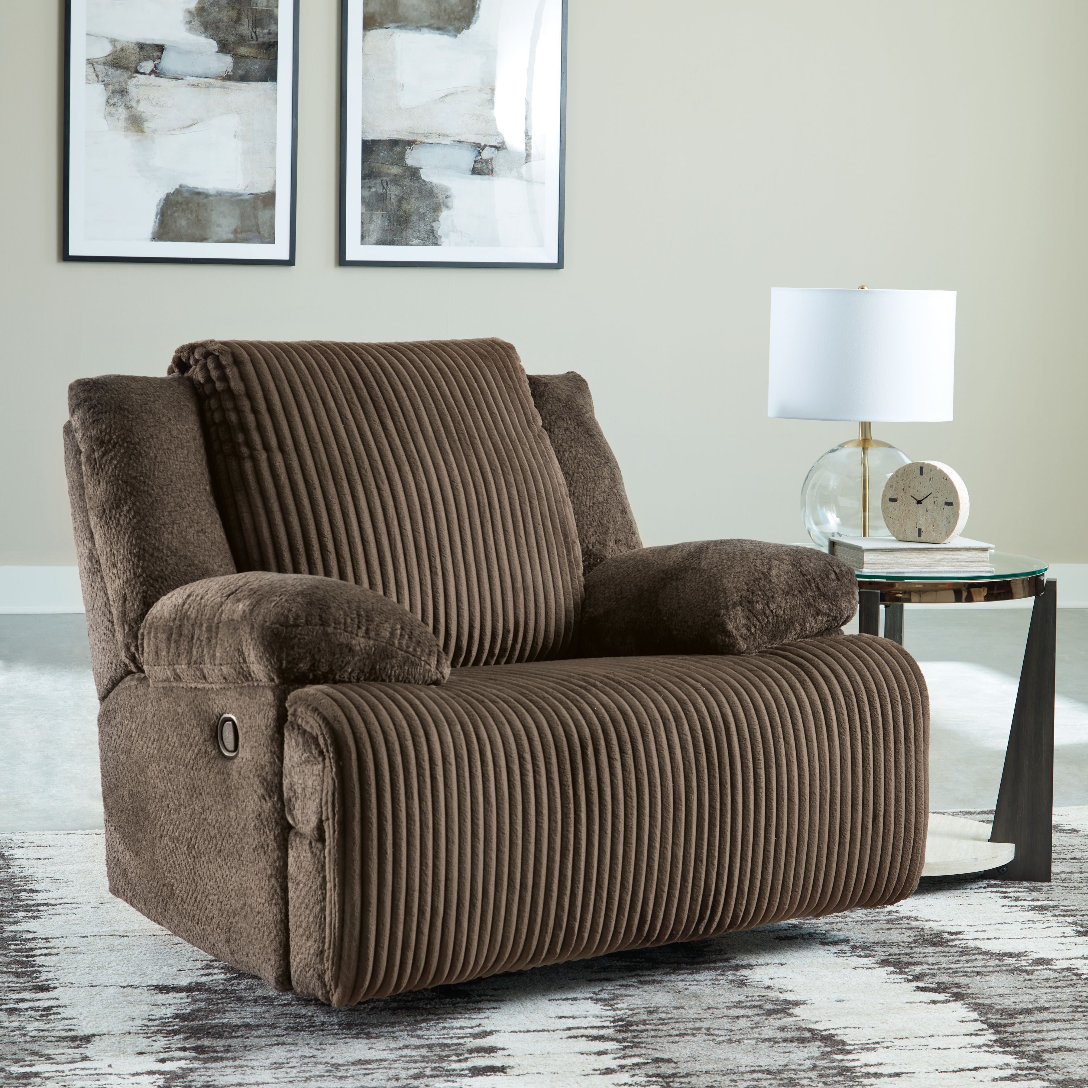 Chocolate rocker recliner chair with ribbed backrest and padded headrest
