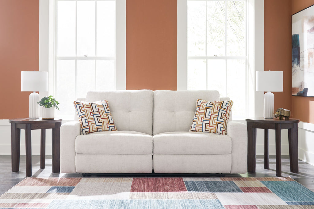 Stone 2-seat reclining sofa with two front cushions and patterned throw pillows