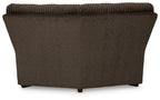 Chocolate brown upholstered wedge sofa section with wide back and tapered base
