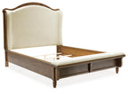 Upholstered panel bed with cream headboard and dark brown wooden frame, slatted base