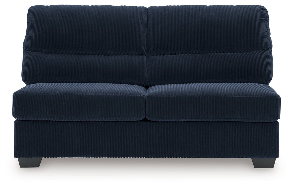 Navy armless loveseat with segmented back cushions, padded seat, and low block legs.